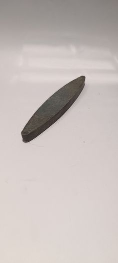 A Canoe Shaped Medium Grit Sharpening Stone