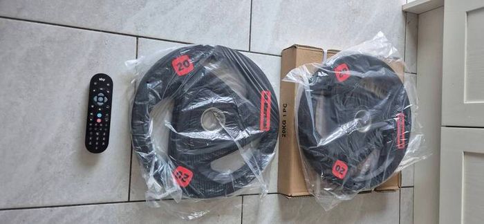 brand new 2x20 kilo olympic tri grip plates