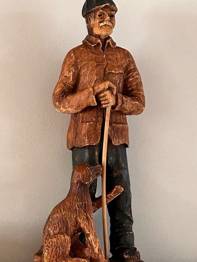 Beautiful man and dog wooden carved figure