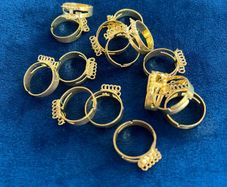 Set of 14 gold tone adjustable rings