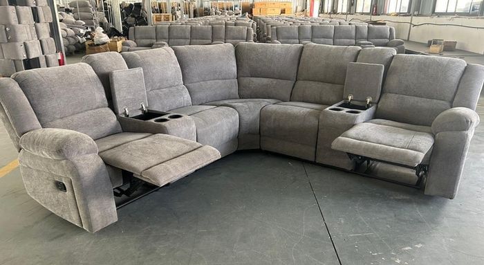Corner sofa recliner in fabric