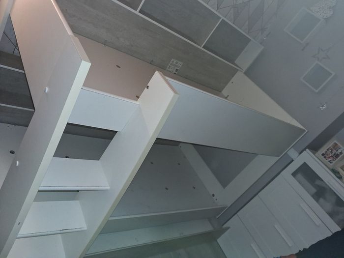 Bunk beds with integrated shelving