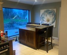 Kitchen presses, island and granite worktops