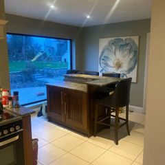 Kitchen presses, island and granite worktops