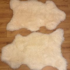 Pair of sheepskin rugs