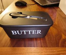 Butter holder with knife