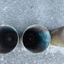 four empty brassartillery shell casings Image 2