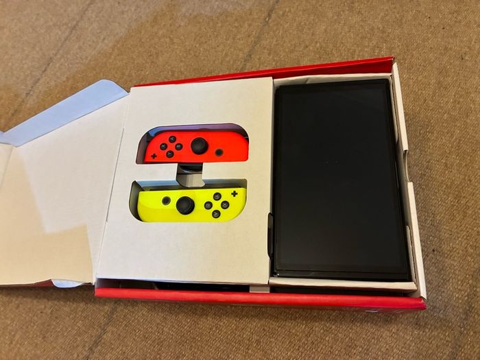 Nintendo Switch OLED bundle (with 4 Joy-Cons, 3 games)
