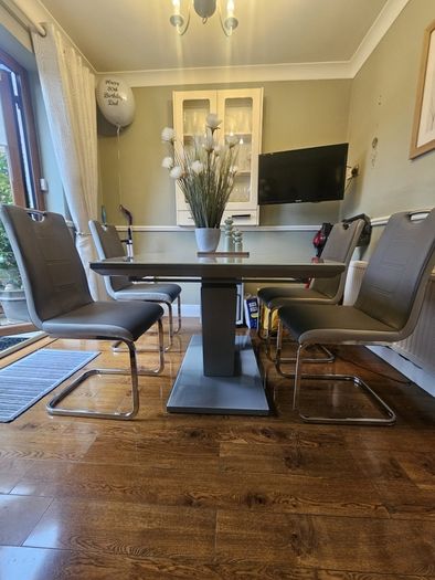 grey glass top dining table (Extendable