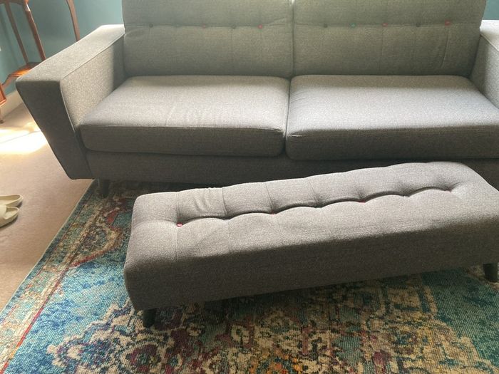 Grey DFS sofa and matching footstool