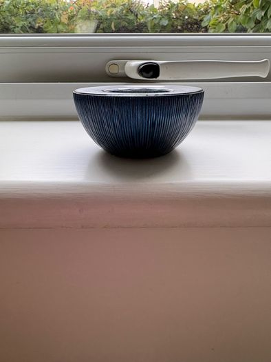 Habitat Navy glass tealight holders.