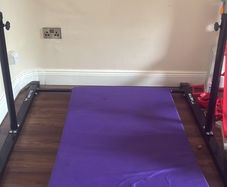 Gymnastics bar and mat
