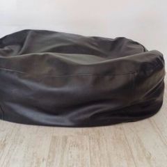 Two black leather-feel bean bags