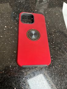iphone 15 pro max with ring stand