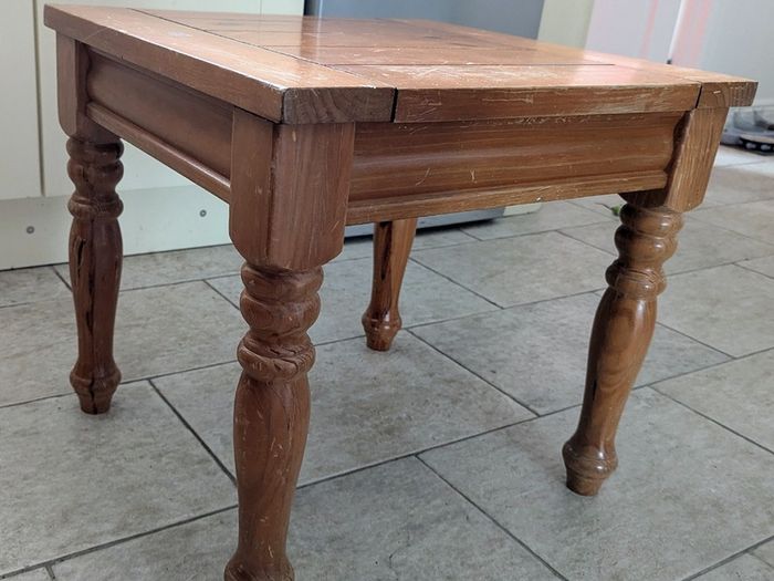 A small wooden side table