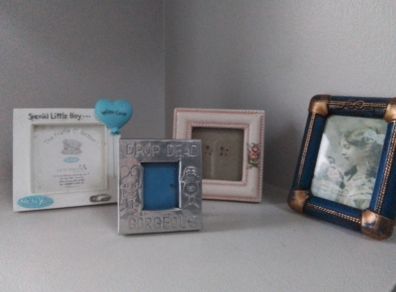 Four small Picture Frames