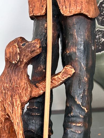 Beautiful man and dog wooden carved figure