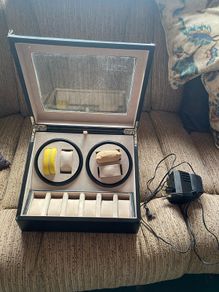 Electric watch moving cabinet