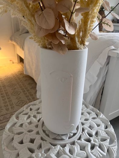 modern vase with grasses