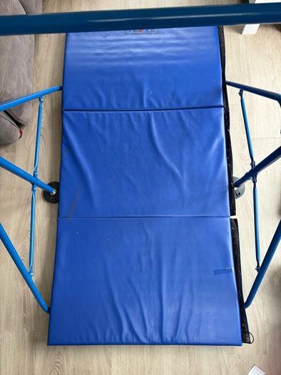 Gymnastics bar and mat for child up to age 8.