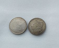United States : Movie Prop Coins - 1893 Morgan Dollar and 1795 Liberty Dollar