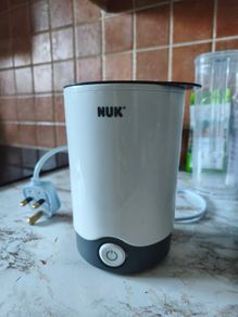 Milk bottle warmer