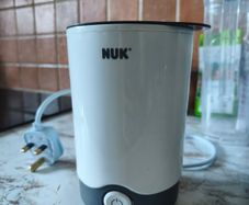 Milk bottle warmer