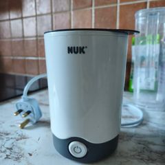 Milk bottle warmer