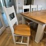 Large extendable 8 seater table with 5 chairs and a bench Image 2