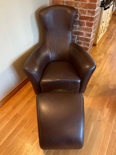 Real leather brown arm chair with foot stool