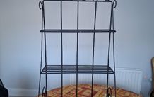 wrought iron unit. can be hung or used freestanding.