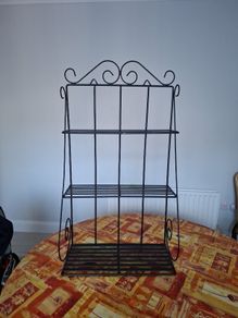 wrought iron unit. can be hung or used freestanding.