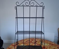 wrought iron unit. can be hung or used freestanding.