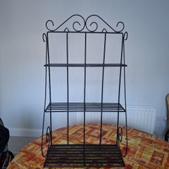 wrought iron unit. can be hung or used freestanding.