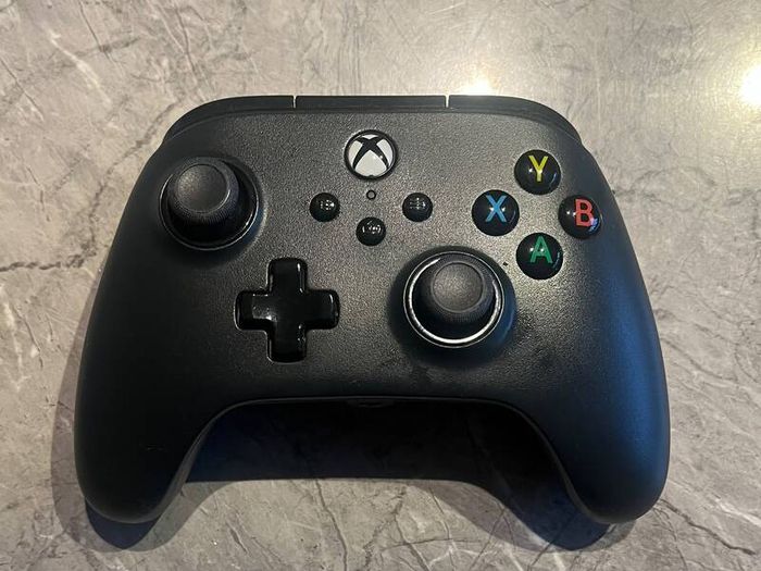 X-Box 1s with steering wheel and peddles