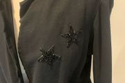 Black casual blazer with embellishment.