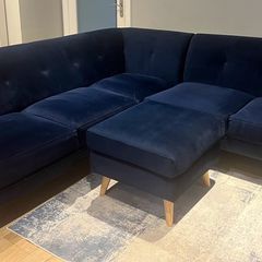 Navy velvet corner sofa and footstool