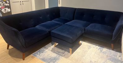 Navy velvet corner sofa and footstool