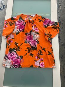 Flowery orange blouse from warehouse