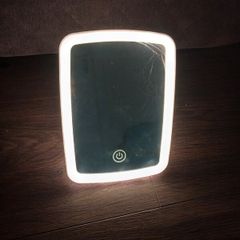Compact LED Makeup Mirror with Touch Sensing, Featuring Three Lighting Options