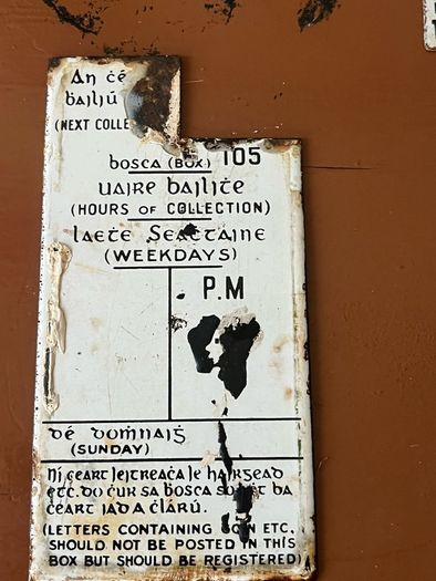 Original Enamel signs license to sell stamps. Collection times and days