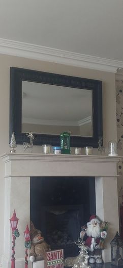 Black rectangle mirror with gold stud detail