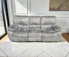 Grey 3 seater recliner sofa.