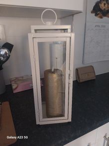 new cream lantern with candle