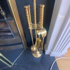 traditional brass fireplace companion set.