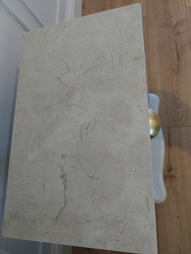 2 marbled top cabinets