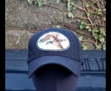 Hat with duck patch