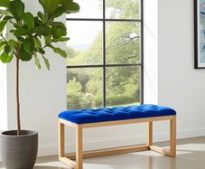 Wooden frame bench with velvet blue seat