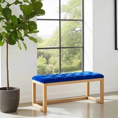 Wooden frame bench with velvet blue seat