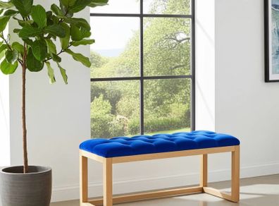 Wooden frame bench with velvet blue seat